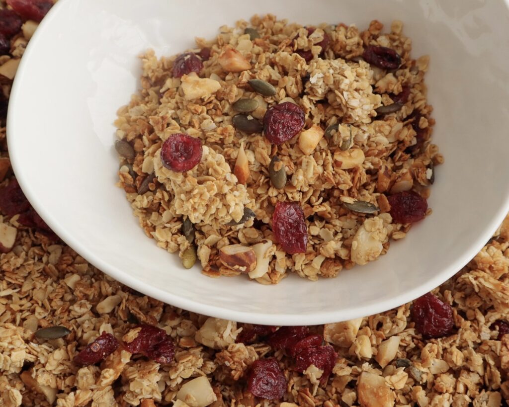 Fresh batch of healthy homemade granola with brown sugar and honey