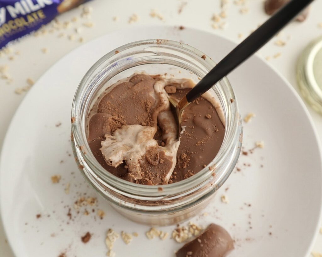 Broken chocolate shell layered over overnight oats