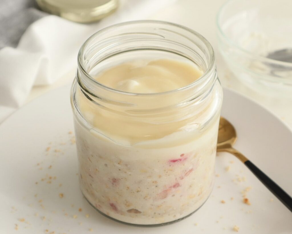 Strawberry Overnight Oats with Yoghurt and White Chocolate Topping